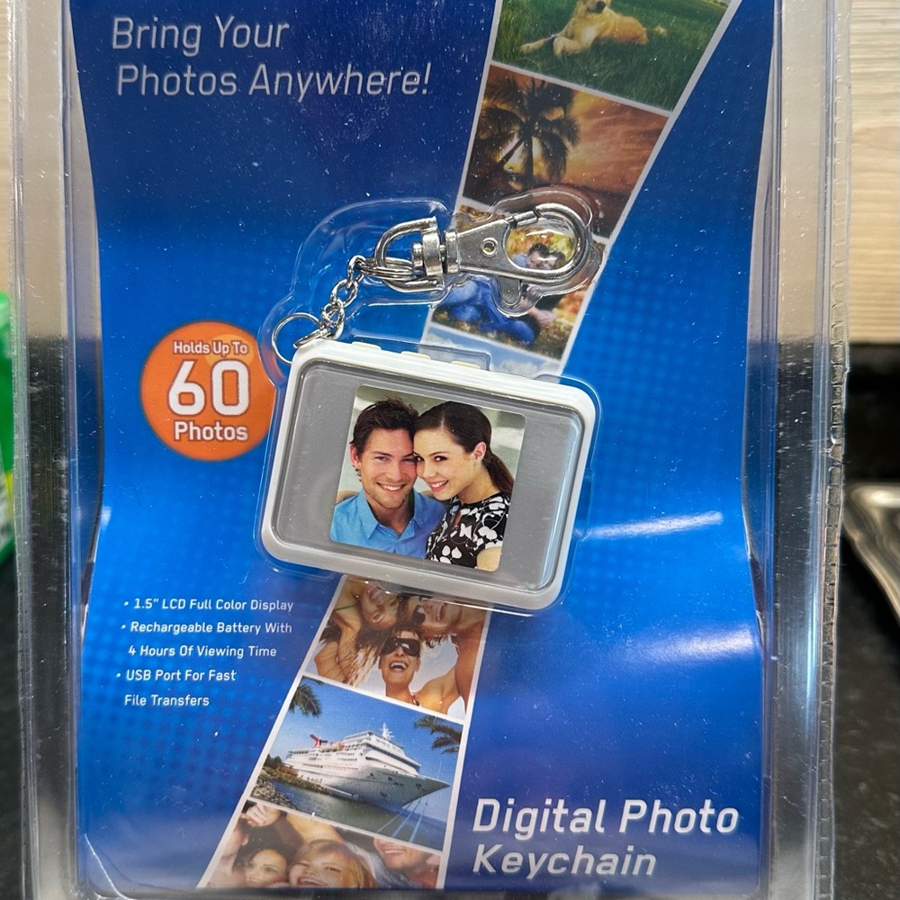 Digital Photo Keychain with Color Display, rechargeable battery. Hold 60 photos.